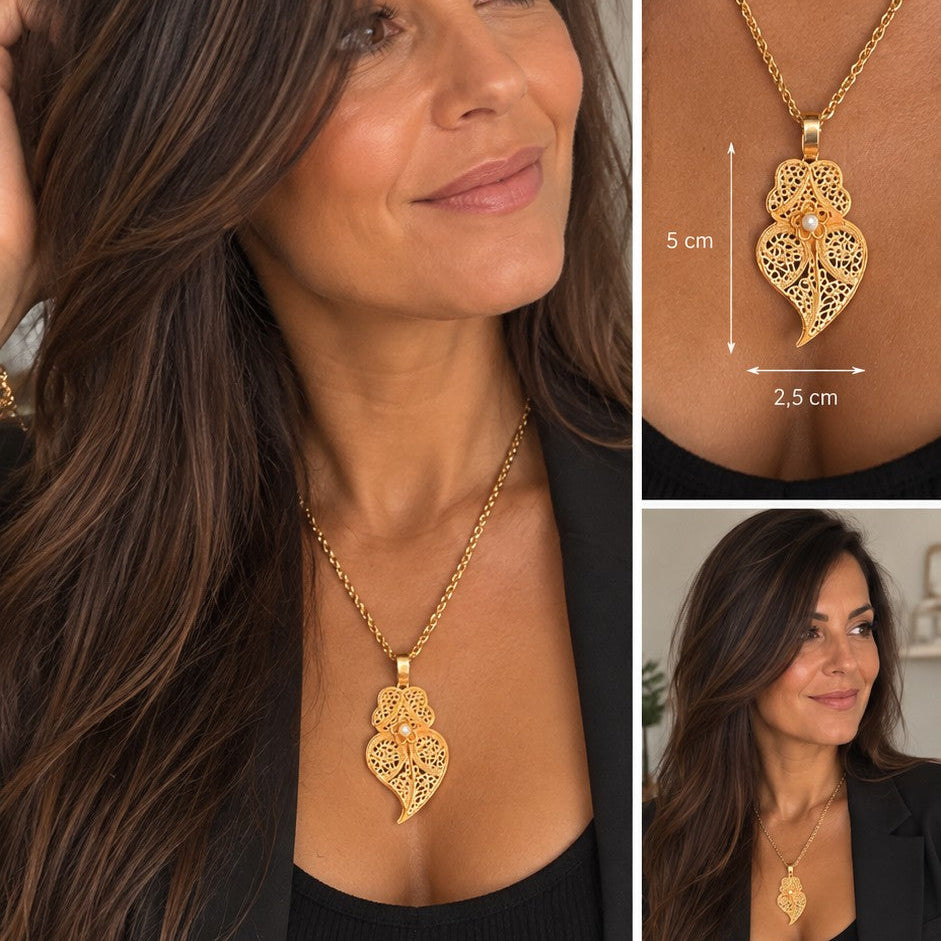 Collier Cœur de Viana doré en acier inoxydable 316L porté sur une tenue noire
