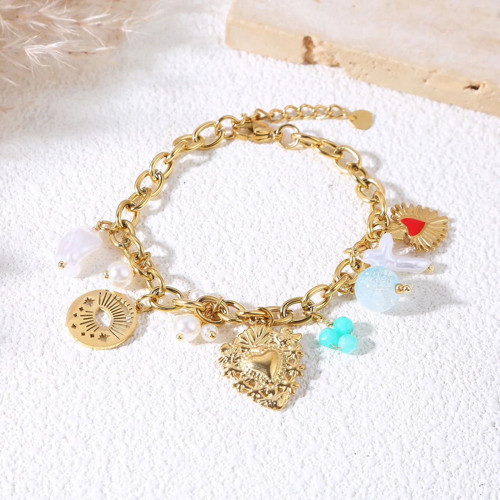 Bracelet Coeur Sacré - chaîne doré et breloques