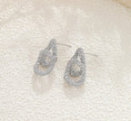 Boucles d'oreilles Agathe argentées – doubles cercles texturés et scintillants en acier inoxydable 316L – FLIDEA