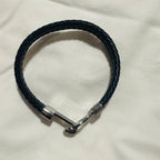 Bracelet homme Swann en cuir tressé noir ouvert avec fermeture frontale en acier inoxydable 316L