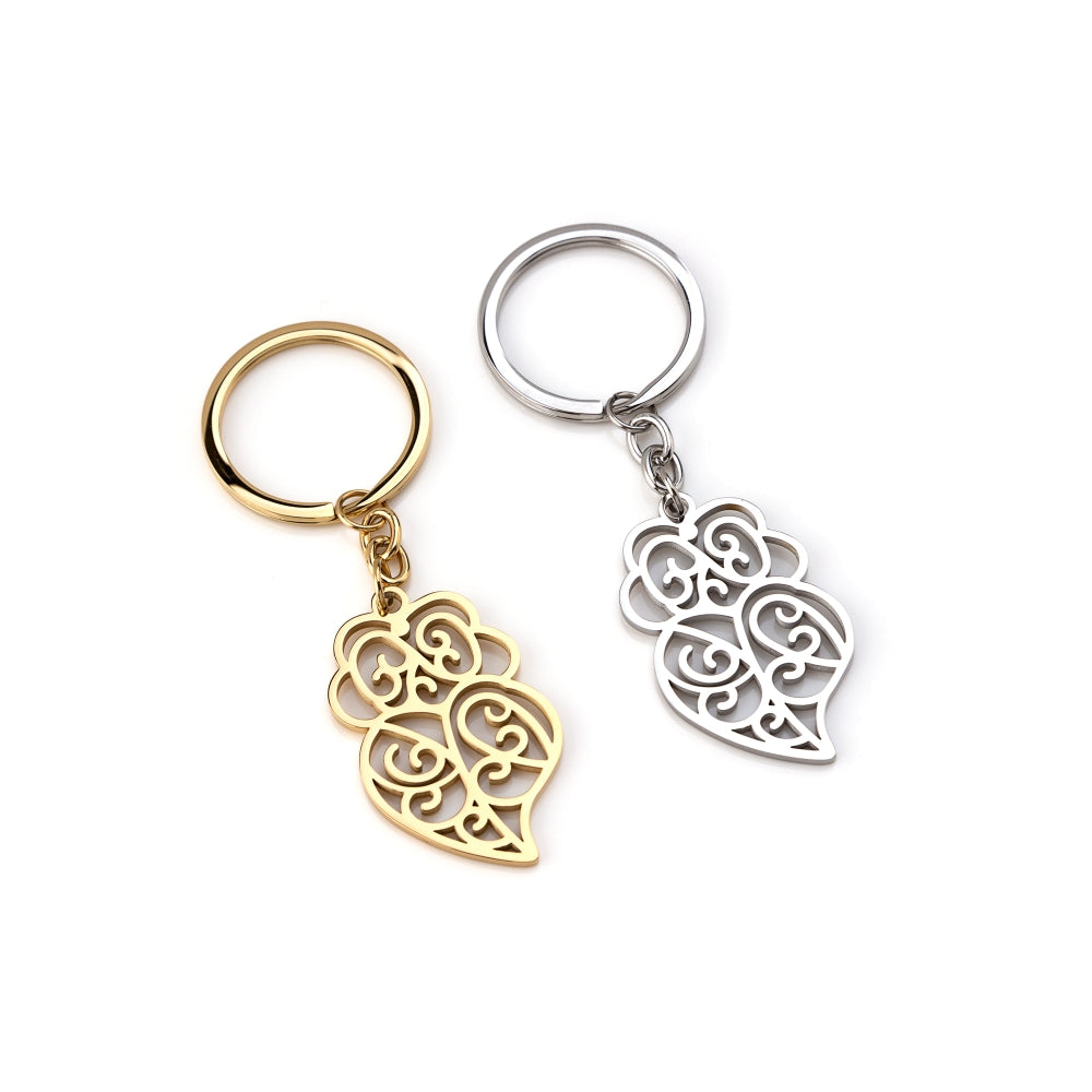 Porte-clé Cœur de Viana en finitions dorée et argentée, avec pendentif ajouré